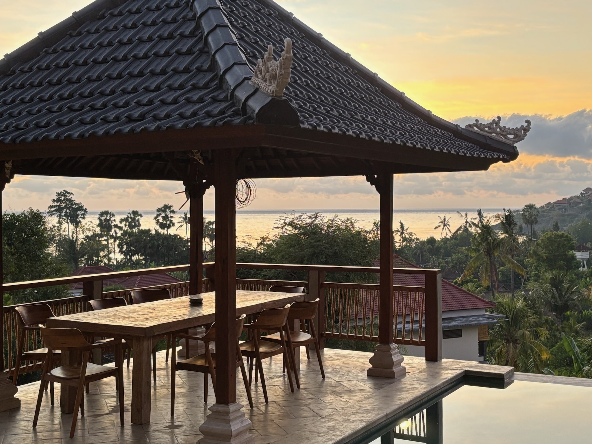 Large undercover dining space poolside with ocean view