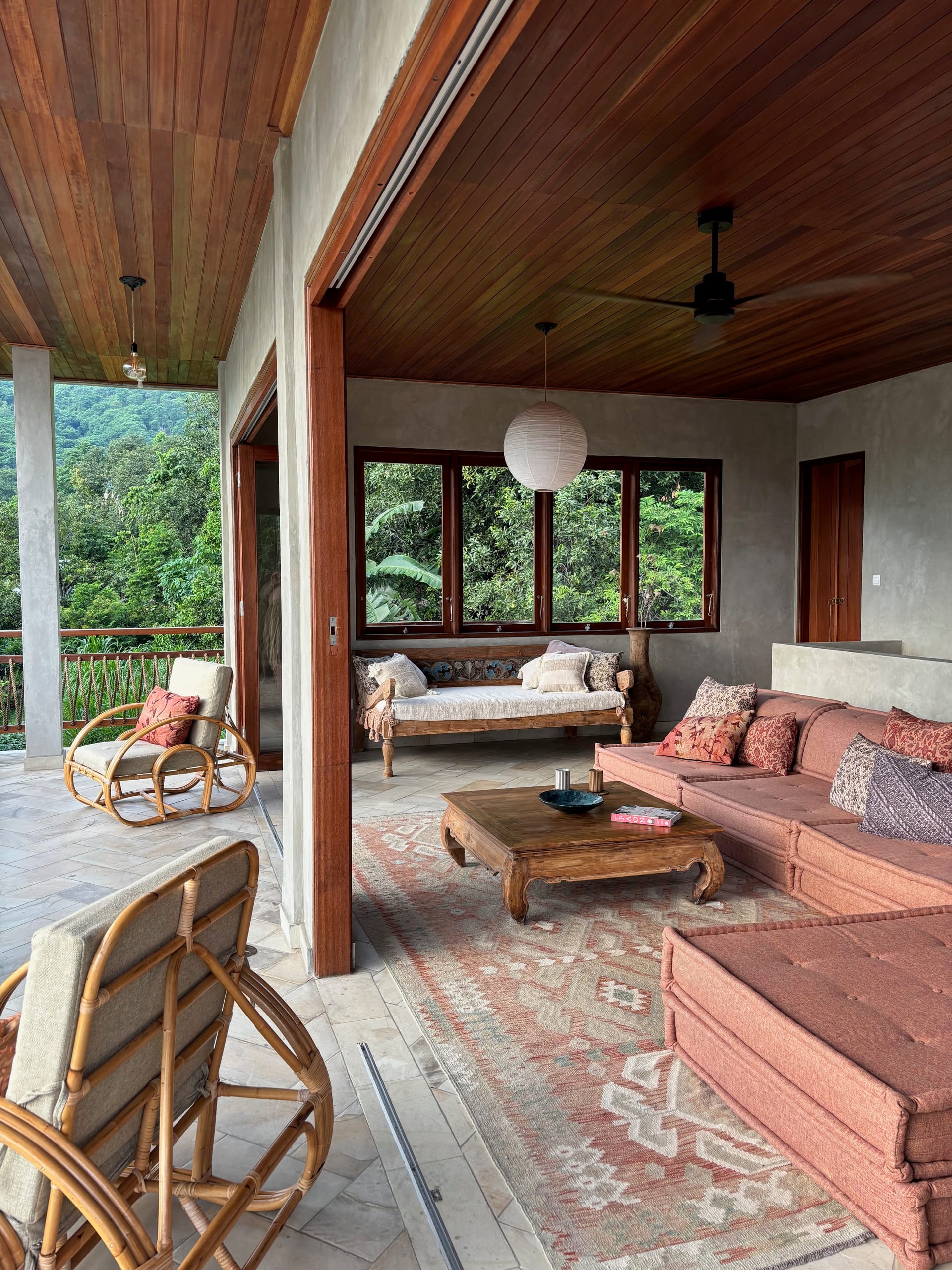 Spacious upstairs living room with large family sofa and day bed